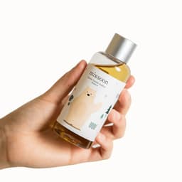 Frasco Mixsoon Soondy Centella Asiatica Essence con diseño de oso polar, essence coreana con centella disponible en Perú