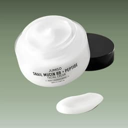 Jumiso Snail Mucin 88 + Peptide Facial Cream abierta mostrando textura cremosa , crema coreana no comedogénica con mucina de caracol para regenerar e hidratar la piel